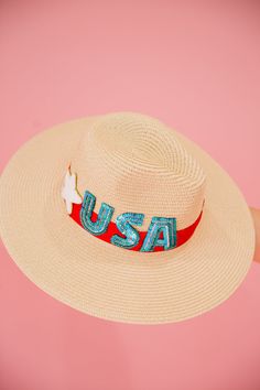 MISS PATRIOT STRAW SUN HAT Hats Judith March Trendy Adjustable Hats For 4th Of July, Fun Summer Fedora Straw Hat, Patriotic Beach Hat For 4th Of July, Patriotic 4th Of July Beach Hat, Patriotic Hat For Beach On 4th Of July, Patriotic Beach Hat For Spring, Patriotic Beach Hats For Spring, Patriotic Hats For Beach In Spring, Americana Style Summer Hat With Curved Brim