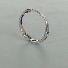 A free size sterling silver ring with a gourmette design. SIZE: 1.3mm x 3mm x 17mm as sold ( It is open ended and can be adjusted to fit most fingers) WEIGHT: 1.07 gm This ring is made of 925 hypoallergenic sterling silver. Most of my pieces come with a 925 stamp. Can be packaged in a gift box. I can include a personal message from you if needed You are welcome to contact me at... bhavnakwintra1956@gmail.com For more beautiful pieces from my shop, please browse 👇 TOE RINGS: https://www.etsy.com Trendy Stackable Sterling Silver Jewelry, Sterling Silver Hoop Jewelry With A Modern Twist, Modern Hoop Rings Tarnish Resistant, Modern Twist Sterling Silver Hoop Jewelry, Silver Circle Fine Jewelry, Fine Silver Circular Jewelry, Modern Twist Silver Hoop Jewelry, Modern Twist Sterling Silver Open Ring Jewelry, Silver Minimalist Stackable Jewelry