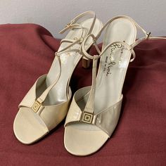 Vintage Euc Or Nwot Designer Patent Leather Italian Heels Has A Zero On The Bottom I Think They Are Size 9 Or 9.5 Heel Strap Is Adjustable For Snug It I Couple Minor Flaws On The One Side As Pictured Heel Is 3.5 Inch Loc Z31 Vintage Cream Party Heels, Classic Beige Sandals For Party, Classic Beige Heels For Party, Classic Beige Party Heels, Cream Patent Leather Sandals For Formal Occasions, Cream Patent Leather Heels For Evening, Formal Cream Patent Leather Sandals, Cream Open Heel Formal Heels, Cream Formal Heels With Open Heel