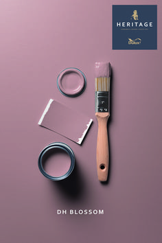 a paintbrush and some other items on a purple surface with the words heritage direct above it