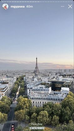 the eiffel tower towering over the city of paris, france at sunset time