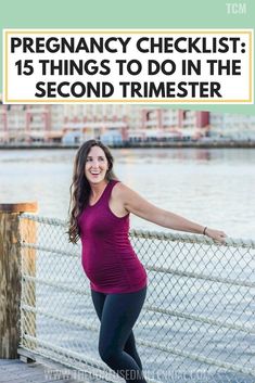 a pregnant woman leaning against a fence with text overlay that reads, pregnant checklist 15 things to do in the second timester