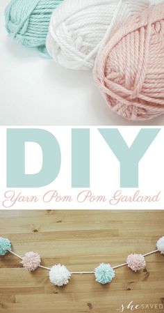 yarn ball garland with pom poms on it and the words diy written in white