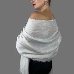 Simple but elegant shawl scarf for your wedding party or evening dress. Made of soft viscose ( polyester) .   Color: white silver thread ( other colors are available ) Size : 180 cm x 76 cm   You can use it as a wrap, shawl or stola. WE have matching bags in our Etsy Shop! WE accept credit cards! Shawl Wedding, Wedding Shrug, Elegant Shawl, Pashmina Wrap, White Scarf, White Scarves, Wrap Shawl, Bridal Gift, Shawl Scarf