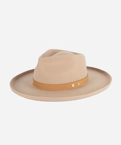 With a soft oiled leather band + pinched teardrop crown, the Luca is our new go-to fedora. Its classic shape mixed with a structured pencil roll brim makes Luca an easy choice for new hat lovers to the most avid hat girl. Classic Leather Fedora With Flat Brim, Classic Leather Fedora With Curved Brim, Classic Leather Fedora, Classic Flat Brim Hat With Leather Lining, Classic Leather Fedora With Flat Crown, Classic Beige Hat Bands For Everyday, Classic Leather Felt Hat With Curved Brim, Everyday Leather Fedora With Curved Brim, Everyday Leather Fedora With Short Brim