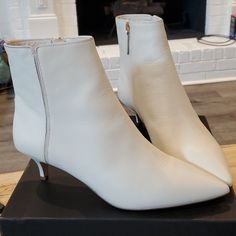 Brand New Leather Ankle Booties - Box Included These Bright, Stylish Stunners Are Ready For Constant Rotation In Your Closet! Pointed Toe Gives A Classic And Well Put-Together Look When Paired With Jeans, Trousers, Dresses Or Skirts. Priced To Sell - Free Shipping! Color: Ivory/Off-White Size: 9.5 Please Zoom In And Out Of Pictures-Ask Any Questions. Thank You! White Boots With Sculpted Heel For Work, White Round Toe Boots For Office, Chic Off-white Pointed Toe Boots, Chic Off White Pointed Toe Boots, Formal Cream Ankle Boots, White Spring Office Boots, Leather Booties With Reinforced Heel In Cream, Leather Cream Booties With Reinforced Heel, Cream Leather Booties With Reinforced Heel