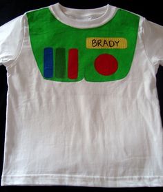 a white t - shirt with a green and red design on the chest that says brady