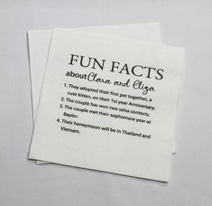 two white napkins with black writing on them that read fun fact's about clam and elga