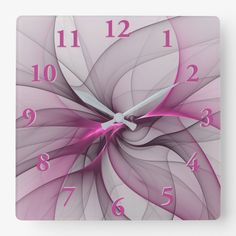 a square clock with pink and white flowers on it