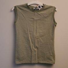 Gap Factory Store Stretch Tank Gap Spring Tank Top, Gap Fitted Casual Tank Top, Gap Casual Fitted Tank Top, Casual Fitted Gap Tank Top, Spring Cotton Tank Top By Gap, Casual Green Sleeveless Top, Gap Cotton Tank Top For Summer, Gap Sleeveless Tank Top For Summer, Striped Tank Top With Vest Detail