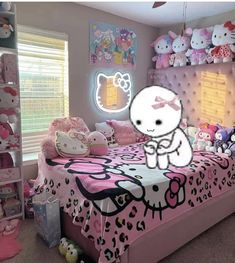 a bedroom with hello kitty bedding and lots of stuffed animals