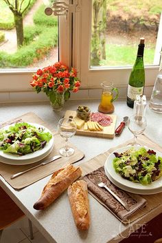 the table is set for two people to enjoy their meal