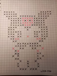 a cross stitch pattern with red and black crosses