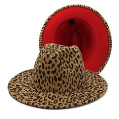 This sophisticated and chic leopard and red fedora is the fashion statement for any event, any location, and any time of the year. You are sure to turn heads and receive plenty of compliments because of the polished look these fedoras give. At upscale events, or even more casual events, you'll be the center of attention. Description: 65% Cotton, 35% Polyester Unisex,: For Both Men and Women Size: One Size (22.1 in) Adjustable headband Ladies Fedora Hat, Fedora Fashion, Fedora Hat Women, Boho Hat, Wide Brim Fedora, Red Bottom, Felt Fedora, Church Hats, Wedding Hats