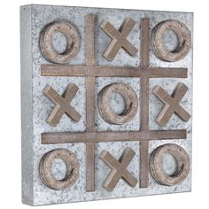 a tic - tac - toe board with wooden letters and numbers on it