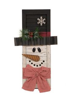 a snowman made out of an old door