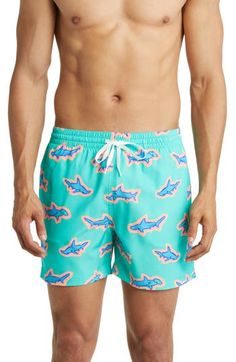 Lightweight and impossibly stretchy, these swim trunks move easily in the water and dry quickly on land for comfort no matter how you enjoy the sun. 4 1/2" inseam; 23" leg opening; 11 1/2" front rise; 15" back rise (size Medium) Elastic/drawstring waist Side-seam pockets; back welt pocket Mesh liner Polyester/spandex or cotton/polyester/spandex Machine wash, tumble dry Imported Men's Clothing Green Swim Trunks With Built-in Shorts For Water Sports, Green Moisture-wicking Swimwear For Beach, Moisture-wicking Bottoms For Beach Season Swimming, Moisture-wicking Bottoms For Beach Swimming, Green Short Swim Trunks For Surfing, Green Swimming Shorts For Vacation, Green Swim Shorts For Vacation, Green Swim Trunks For Water Sports, Green Swimwear With Built-in Shorts For Vacation