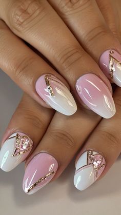 a woman's hands with pink and white nails