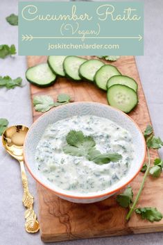 cucumber raita dip in a bowl on a cutting board