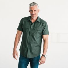 Description Details Care Fit This Primer Casual Utility Shirt is all about durability with reinforced stitching and versatile pockets, giving off a laid-back, masculine vibe. It's the ultimate choice for sunny days or when long sleeves just won't cut it. Its classic spread collar and fitted design add a timeless touch, making it a great match with deep-wash jeans and sneakers for effortless style. see more outfitting ideas here > • Soft classic spread collar• Reinforced cross chest seams• Well p Shot In The Dark, Soft Classic, Navy Shirt, Washed Jeans, Soft Hands, Forest Green, Favorite Shirts, Cut And Color, Men Short Sleeve