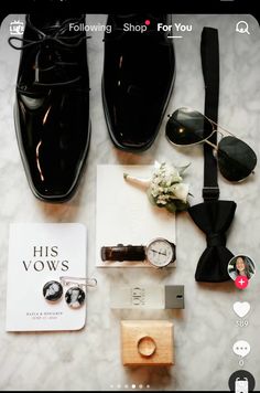 an assortment of men's accessories including shoes, watch and sunglasses on a marble surface