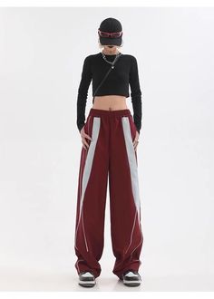 Product information: Style: Casual/Street/Vintage/Preppy/Punk/Hip Pop/Sporty/Y2K/Sweet Fabric name: Polyester Color: wine red. black Elasticity: inelastic Main fabric composition: Polyester (polyester fiber) Pants length: trousers Waist type: high waist Size: M.XL.L.XXL Applicable Gender: Female Pants type: loose typeDescription:Fashioned from luxe polyester fabric. these trousers boast a chic. high-waisted design. Available in a range of classic colors including wine red and black. these versatile bottoms offer an unbeatable combination of effortless style and comfort. Boasting a selection of sizes from M to XXL. these timeless garments are perfect for honing your casual. preppy. punk. hip pop. sporty. Y2K. and sweet looks.Size: Retro Winter Streetwear Bottoms, Trendy Baggy Red Bottoms, Red Baggy Bottoms For Winter, Retro Black Bottoms For Winter, Red Baggy Hip Hop Pants, Casual Burgundy Bottoms For Streetwear, Trendy Burgundy Bottoms For Winter, Retro Red Bottoms For Streetwear, Retro Red Bottoms For Winter