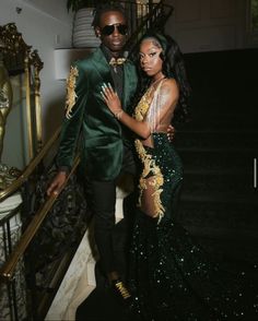 Posion Ivy Prom Dress, Emerald Green Prom Dress With Gold, Champagne Prom Dress Black Couple, Green Prom Suit Black Men, Prom Dresses For Dark Skin Black Women, Green And Gold Prom Dress Black Women, Jamaican Prom Dress, Prom Dress Gold And Black, Emerald Green Prom Dress With Date