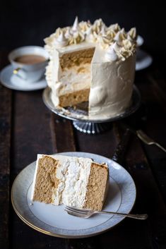 there is a piece of cake on the plate and another slice has been cut from it