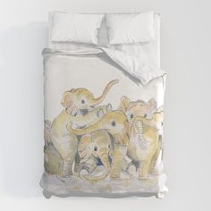 an elephant family is depicted on this duvet cover