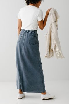 With the look of real denim but the feel of a quality knit, comfort is the key element in our exclusively designed Caroline skirt. The quick, pull on style makes this skirt an effortless option for wherever your day might take you - running errands, making dinner, playing with the kids, or a quick trip to the coffee shop to grab your favorite latte. Soft, comfortable knit denim fabric 65% Cotton 30% Polyester 5% Spandex Heather Grey & Deep Chambray 70% Rayon 25% Polyester 5% Spandex Hand Wash Co Making Dinner, Dark Blue Grey, Knit Denim, Long Knit, Layered Tops, Skirt Leggings, Knit Skirt, Blouse Dress, Denim Fabric