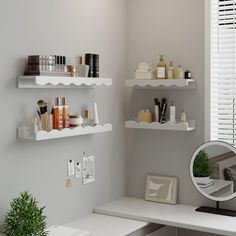 a white desk topped with shelves filled with personal care items next to a window covered in blinds