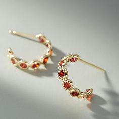 Aptly Named, These Hoops "Hug" Your Ear Lobe For A Chic, Cuff-Like Look. Real Gold Plated Metal, Glass Stones Imported Dimensions 0.75" Diameter New With Tags Elegant Red Metal Hoop Earrings, Elegant Small Hoop Red Earrings, Elegant Small Red Hoop Earrings, Elegant Red Small Hoop Earrings, Anthropologie Jewelry, Ear Cuffs, Real Gold, Red Gold, Anthropologie