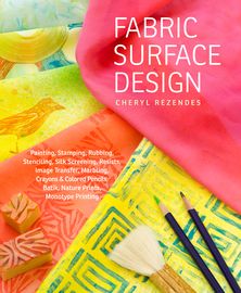 the book cover for fabric surface design with two brushes and paints on top of it