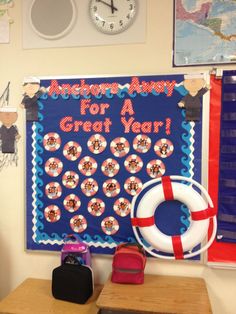 a bulletin board with a life preserver on it