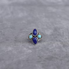 ✦ Experience the captivating dance of turquoise and lapis with our BohoBlend turquoise and lapis lazuli Ring for women. Handcrafted in 925 solid sterling silver, this one-of-a-kind ring marries the vibrant blues of both gemstones in a seamless bohemian design. Simplicity meets uniqueness, ensuring every glance is drawn to its ethereal charm. Perfect as a statement piece, this ring embodies the free spirit of bohemia 💎  Please Note As with all Natural Gemstones The colors and inclusion patterns if applicable may vary slightly. -- -- »» DETAILS -  Gemstone -  Lapis Lazuli And Turquoise Metal - 925 Sterling Silver -- -- »» $ BU Y * M O R E * S A V E * M O R E $ «« ✦ Special 25% OFF when you order 2 items!! Apply Coupon Code: SAVEMORE25 ✦Special 30% OFF when you order 3 or more items!! Apply Nickel-free Blue Turquoise Ring Bohemian Style, Unique Blue Turquoise Multi-stone Ring, Blue Multi-stone Turquoise Ring In Sterling Silver, Adjustable Blue Multi-stone Rings, Adjustable Multi-stone Blue Rings, Bohemian Turquoise Ring With Gemstone, Bohemian Blue Turquoise Ring With Gemstone, Bohemian Blue Turquoise Gemstone Ring, Sapphire Lapis Lazuli Ring Jewelry