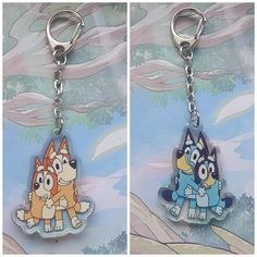 two key chains with cartoon characters on them