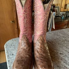 New With Tags No Box (Was Damaged By Tsa On My Flight Home). Only Worn To Try On And In My House To Show My Husband. Beautiful Ostrich And Pink Flower Design. I Absolutely Love Them Just Don’t Fit Quite Right. :( Ladies Cowboy Boots, Fatbaby Boots, Brown Cowgirl Boots, Ariat Boots Womens, Pink Flower Design, Ariat Cowboy Boots, Dress Boots Women, Red Leather Boots, Square Toe Western Boots