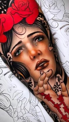 a woman with red roses on her head and hands is shown in this tattoo design