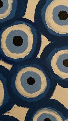 an abstract painting with blue and white circles