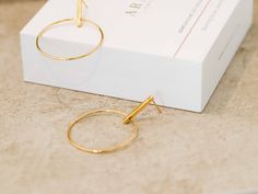 W H A T ∙ M A K E S ∙ T H I S ∙ S P E C I A L Simple but striking, these Minimal Large Circle & Stick Stud Earrings are minimal in design but big on impact. - we use only the finest quality materials - all components are 100% sterling silver or 18k Gold plated (Nickel free) - all pieces are designed in our happy studio D E T A I L S * Available in sterling silver or Crafted in Gold plated .925 sterling silver * Encrusted with zircon stones * Price is per pair * Very easy to put on All jewelr Circle Bar, Stick Earrings, Bar Earrings, Everyday Earrings, Etsy Fashion, Gold Plated Silver, Silver Jewelry, Gold Bracelet, Hoop Earrings