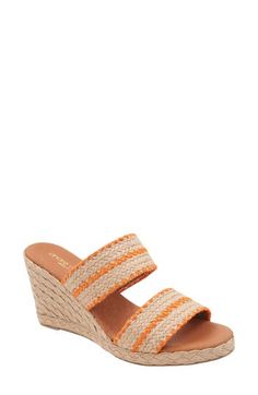 Woven raffia creates a boho aesthetic on an espadrille-inspired slide sandal lofted by a subtle platform and wedge heel. 3" heel; 1/2" platform Cushioned footbed Textile upper/leather lining and sole Made in Spain Orange Platform Wedge Sandals For Summer, Orange Synthetic Wedge Sandals For Spring, Orange Synthetic Wedge Sandals For Vacation, Orange Wedge Sandals For Summer, Orange Open Toe Wedge Sandals For Spring, Casual Orange Synthetic Wedge Sandals, Orange Sandals For Spring Beach Outings, Orange Sandals For Beach And Spring, Spring Orange Open Toe Wedge Sandals