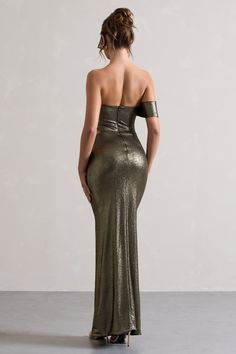 Refresh your formal wardrobe with this contemporary metallic maxi. Defined by its cut-out waist, this gold one-sleeved dress is artfully gathered into a daring high-leg split. For the perfect wedding guest look, try styling Gilded with a pair of strappy stilettos and gold accents. Features- Premium stretch acetate - One-sleeved- Strapless- Waist cut-out- Invisible zip closure- Partially gathered- High-leg split- Maxi length Sizing & fit Model is 5'8" and wears UK size 8 / US size 4 Product informationDesigned exclusively by Club L LondonDouble layered with good stretchPremium acetate in Metallic Gold (95% Polyester, 5% Elastane)155cm total lengthSKU: CL129697007 Leg Split, Black Dress Prom, Strappy Stilettos, Black Tie Gala, Wedding Guest Looks, Party Dress Long Sleeve, Split Maxi Dress, Christmas Party Dress, Bridesmaid Outfit