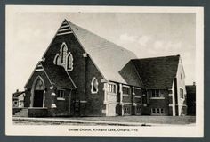 an old black and white photo of a church