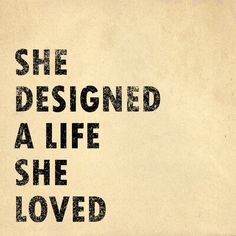 the words she designed a life she loved are written in black on an old paper