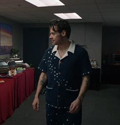 a man standing in front of a buffet table