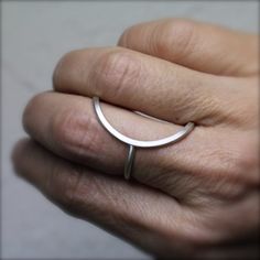 Halbmond (half moon) is a romantic minimalistic crescent moon design. It uniquely hugs your middle finger to make a lunar statement. I fabricated this magical ring from sterling silver in my studio. ** Please note!!! The way the ring is shown it only fits long fingers. Metacarpals that measure 3.5cm Unique Ring Designs Vintage, Romantic Hugging, Half Crescent Moon, Magical Ring, Long Fingers, Unique Sterling Silver Jewelry, Long Ring, Sterling Silver Jewelry Rings, Minimal Jewelry