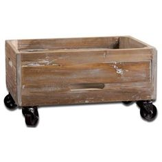 an old wooden box with wheels is shown on a white background for use as a planter