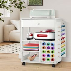 a white shelf with various craft supplies on it