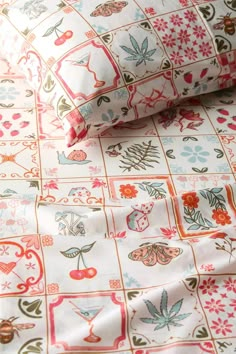 an image of a bed sheet with flowers on it