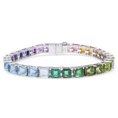 A vibrant combination of natural semi precious gemstones create a rainbow of red, pinks, orange, yellow, greens, violet and purples. Our multicolored gemstone bracelet contains a total of 40.72 carats of natural gemstones. It wears beautifully from day to night, and is crafted from 18 karat white gold. Multi Gemstone Bracelet, White Gold Bracelet, Garnet Earrings, Watermelon Tourmaline, Yellow Gold Earring, Nature Bracelets, Gemstone Bracelets, Exquisite Jewelry, Precious Gemstones